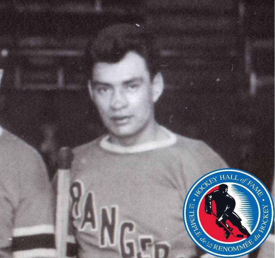 A historic black and white photo of a hockey player