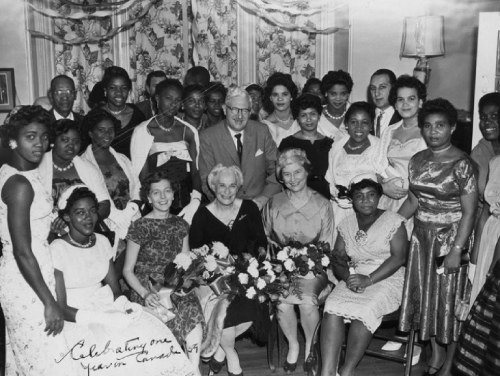 Black and white photo of a group of people posing