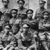 Black and white photo of a group of soldiers in uniforms