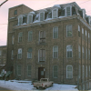 Front and side view of Penman Textile Mill National Historic Site, the first and most important plant of the Penman Manufacturing Company.