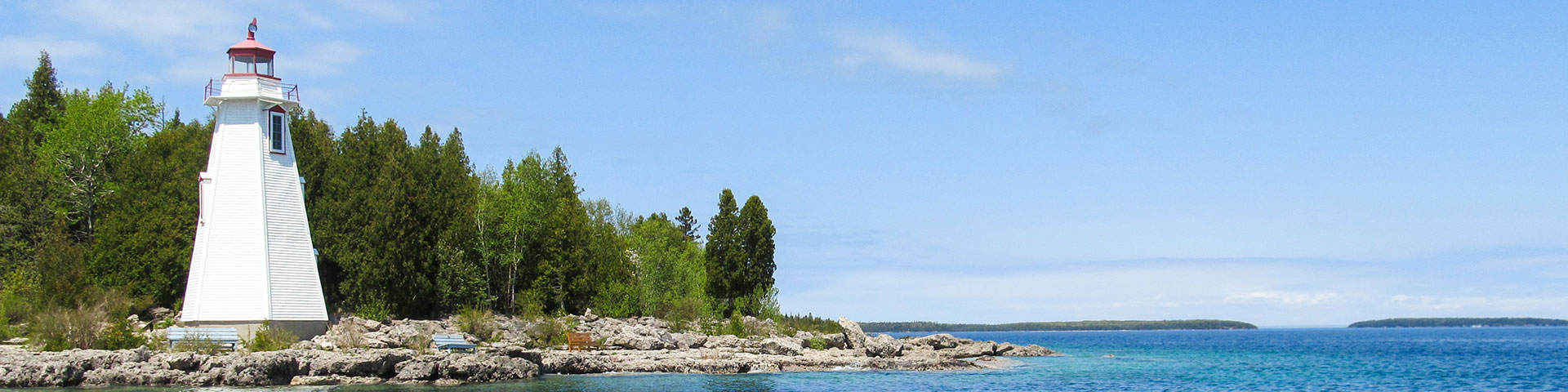 Lighthouse on a rocky shoreline