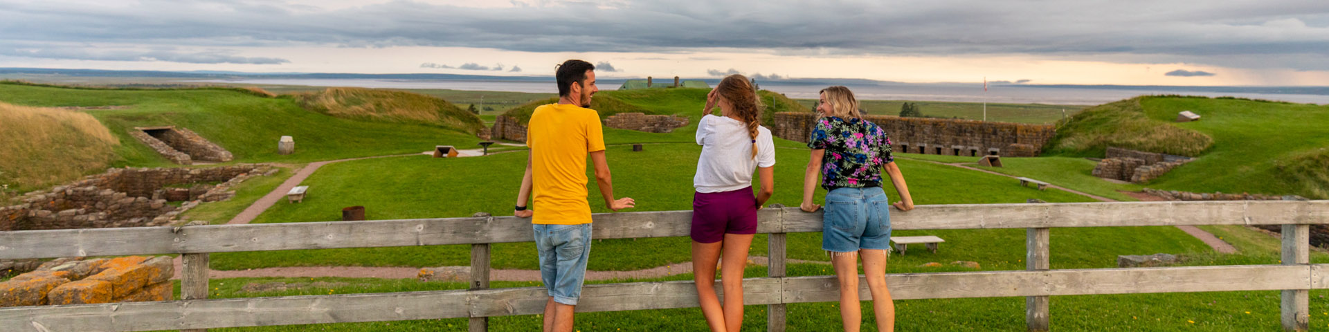 Visitors enjoying the view of the fort from a high viewpoint area.