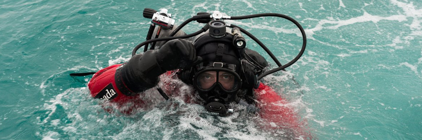 A scuba diver surfacing.