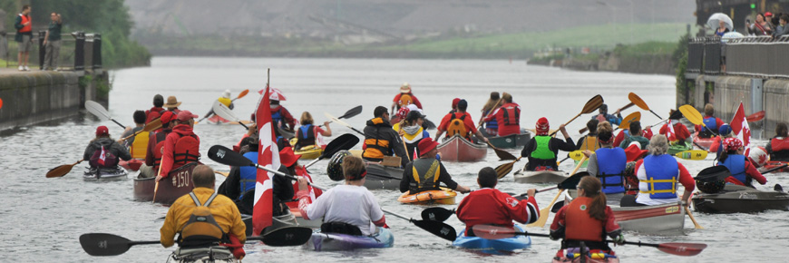 100 paddlers locking through the Sault Canal lock on Canada Day 2017