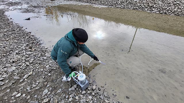 Parks Canada employee sampling the Chambly Canal