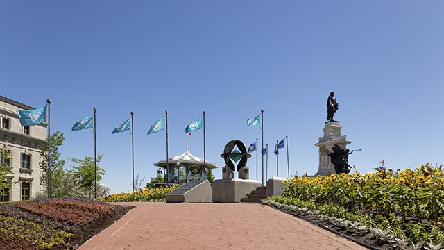 Low angle view of the UNESCO monument, the statue of Samuel de Champlain, the old post office near the Dufferin terrace.