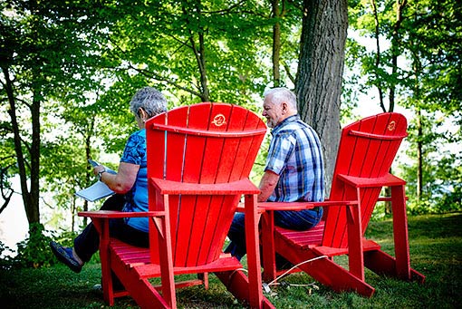 Two red chairs at Manoir-Papineau