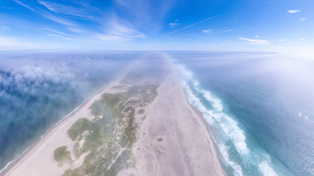 Aerial view of Sable Island through a light layer of fog.