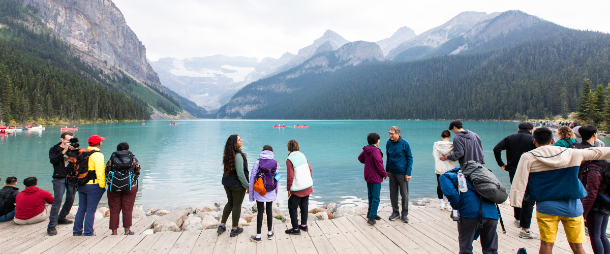 Visitors at the busy Lake Louise lakeshore.