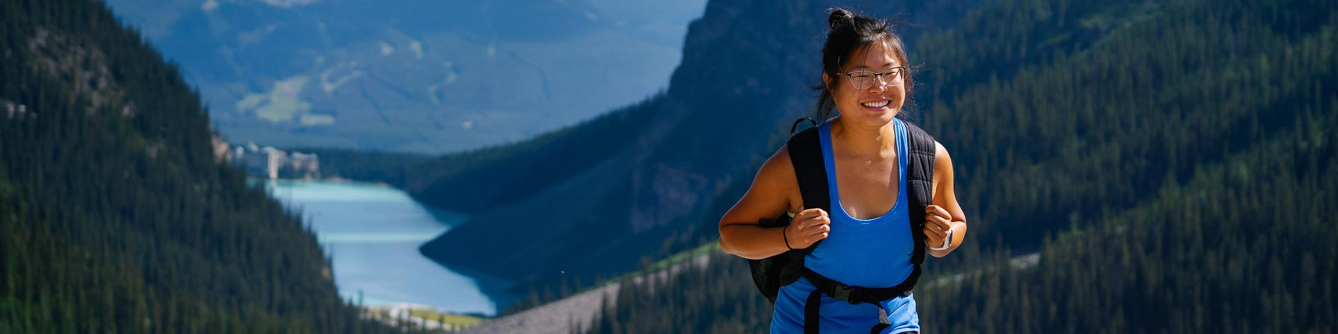 hiker enjoying a hike above Lake Louise