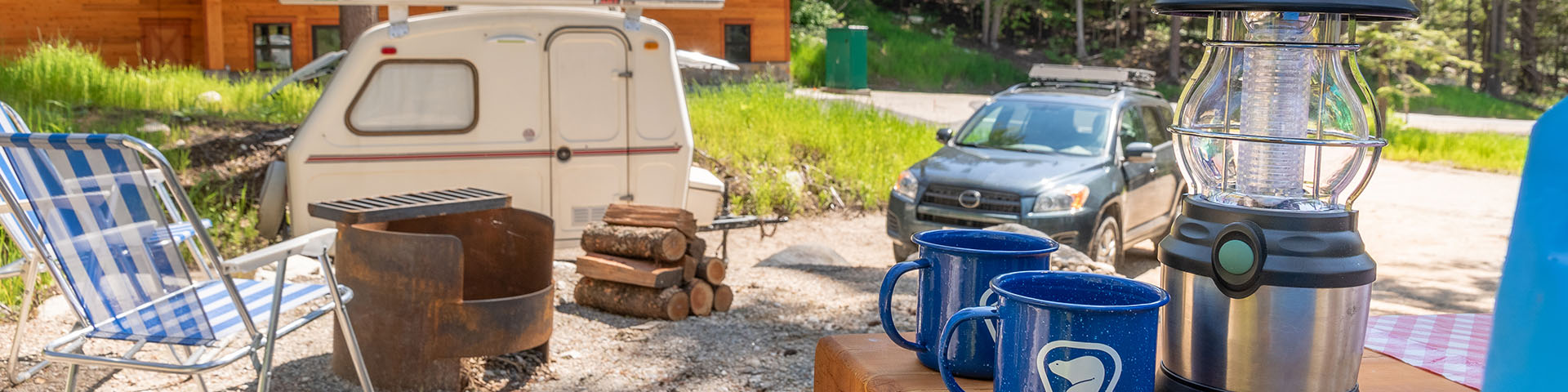 Car and trailer parked at Snow Forest Campground