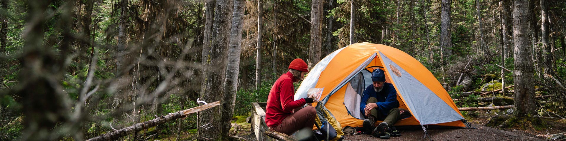 two campers at their campsite