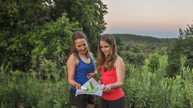 Two women looking at a map