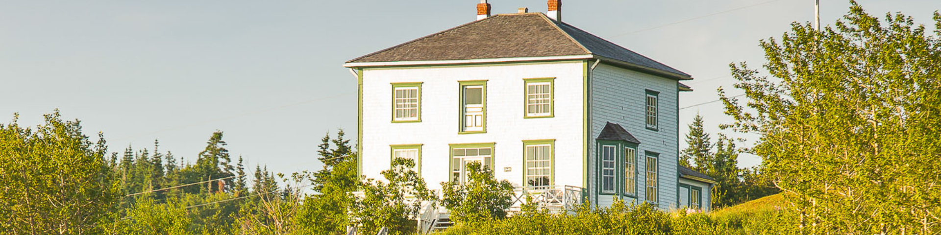 Four-square house on a sidehill. 