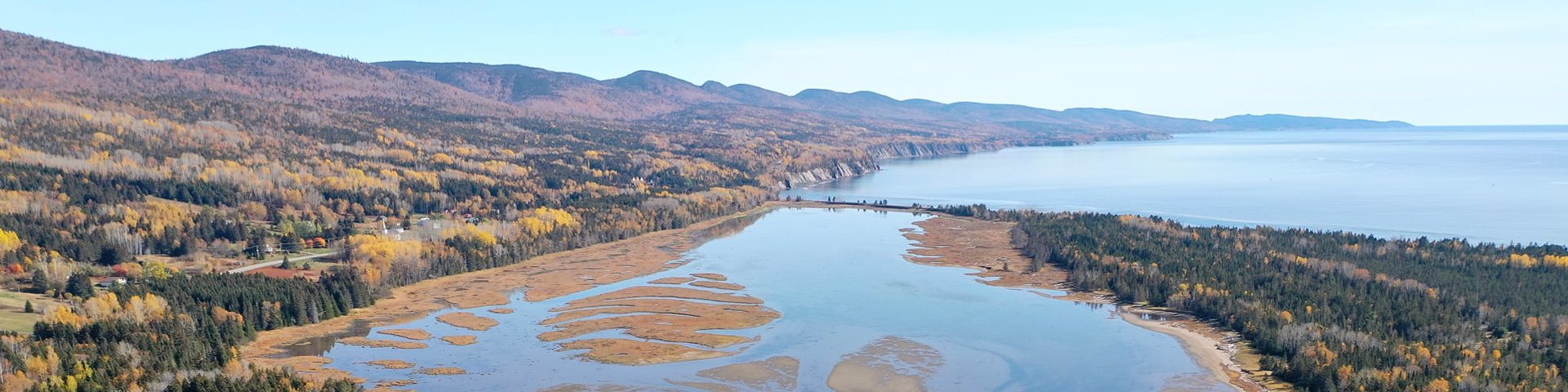 Aerial view of a coastal landscape with a salted marsh.  