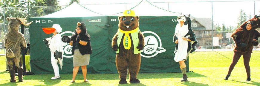 Parka dancing with interpreters wearing animal costumes