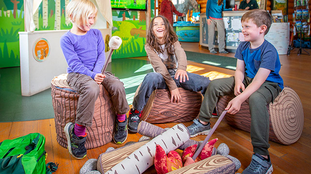 Visitors explore the Parks Canada Nature Centre in Waskesiu in Prince Albert National Park.